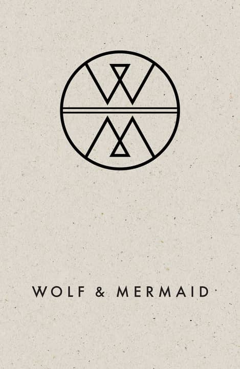 Textured brown paper background with the Wolf & Mermaid logo in black.