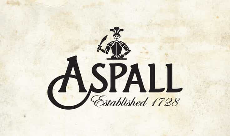 Black Aspall logo on parchment background.