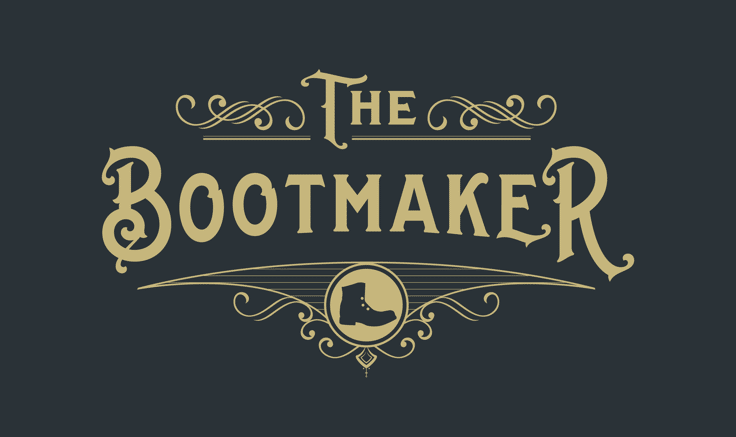 Vintage style logo for The Bootmaker, with ornate swirls and and a boot silhouette. Logo is gold on a dark blue background.