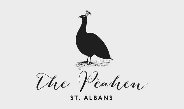 A simple graphic of a peahen in black with a script font beneath stating 'The Peahen'.