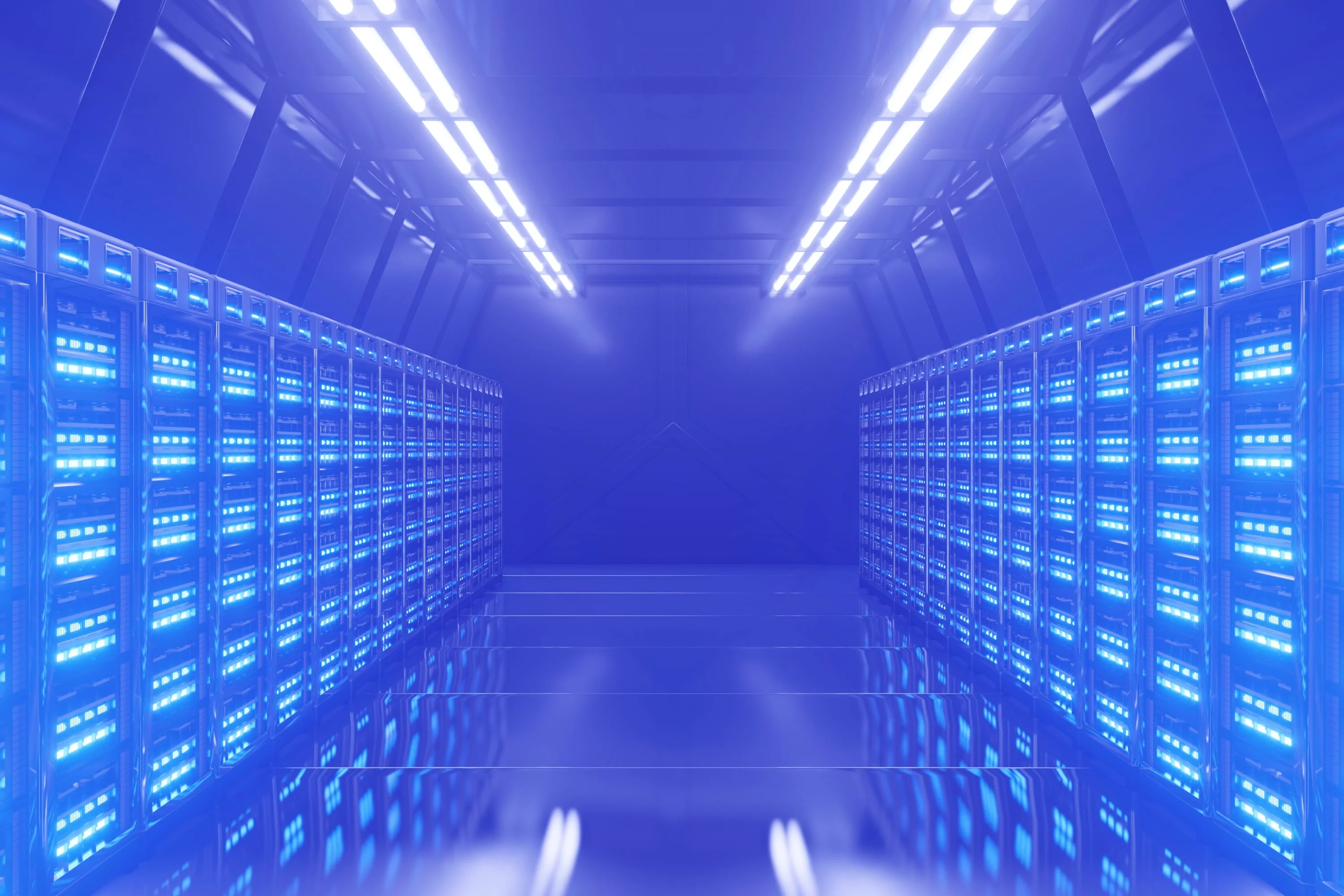 data centre server room corridor with illuminated server racks blue toned