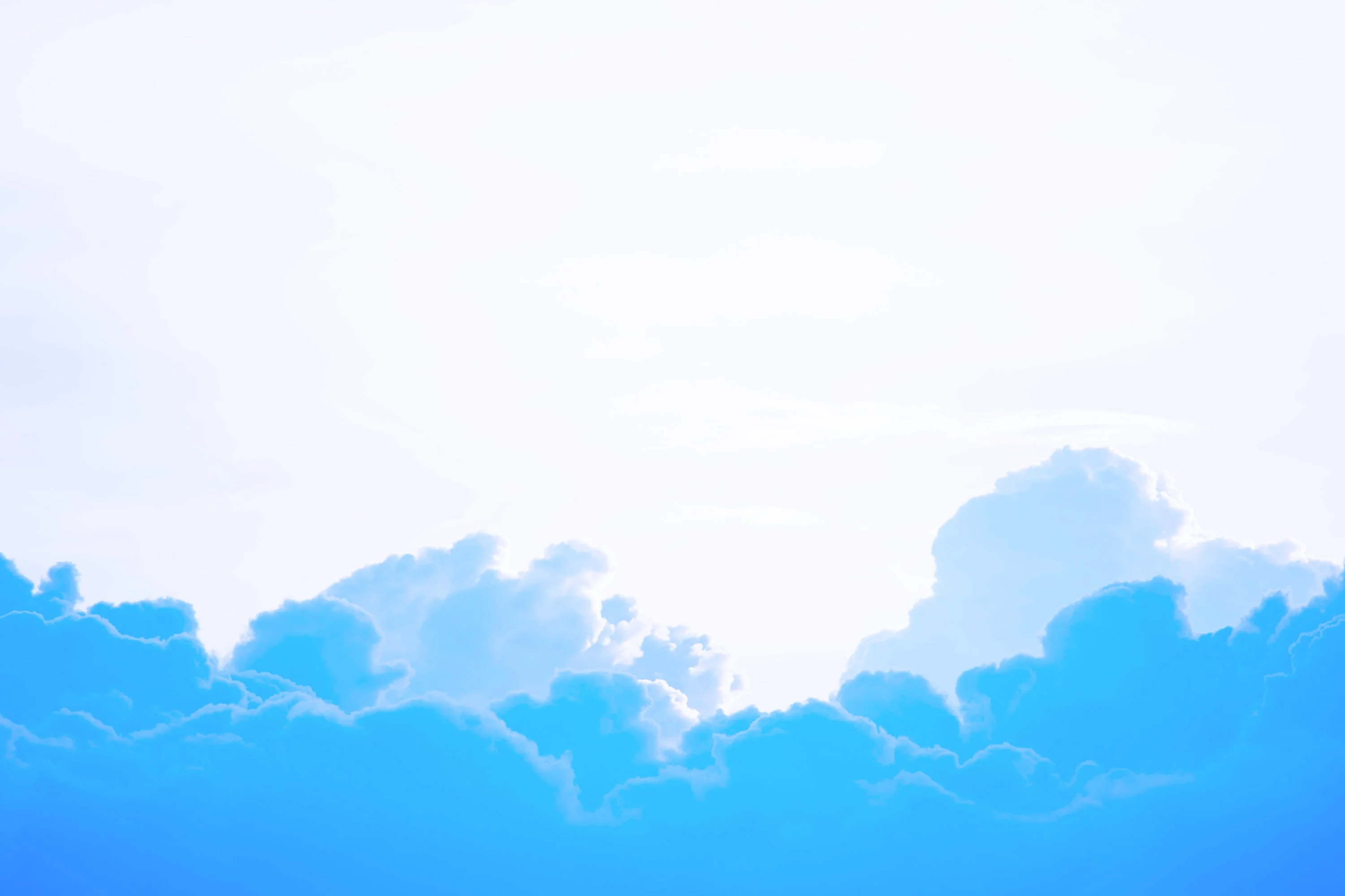 white fluffy clouds against bright blue sky cloud hosting concept