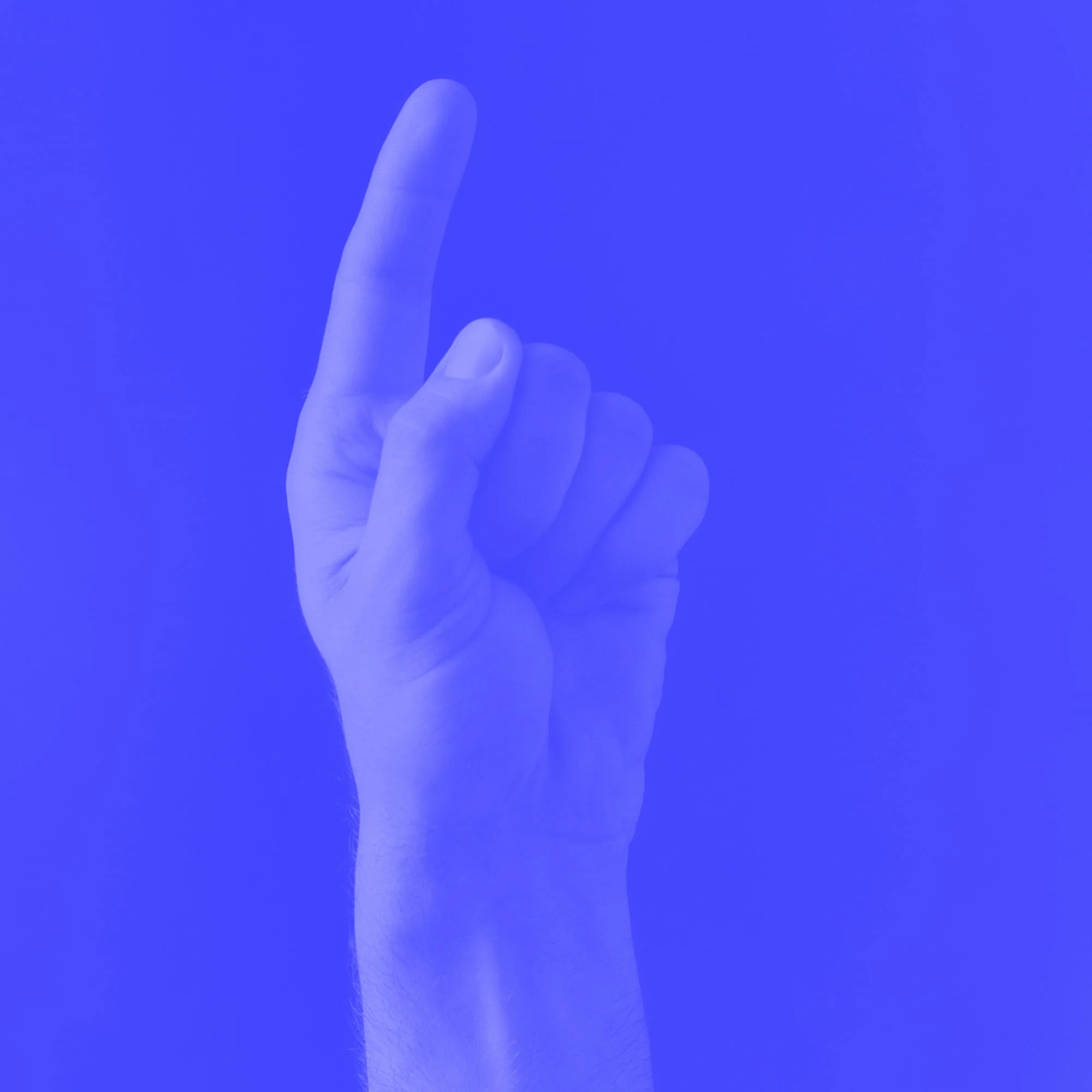 hand pointing index finger upward on blue background tip concept