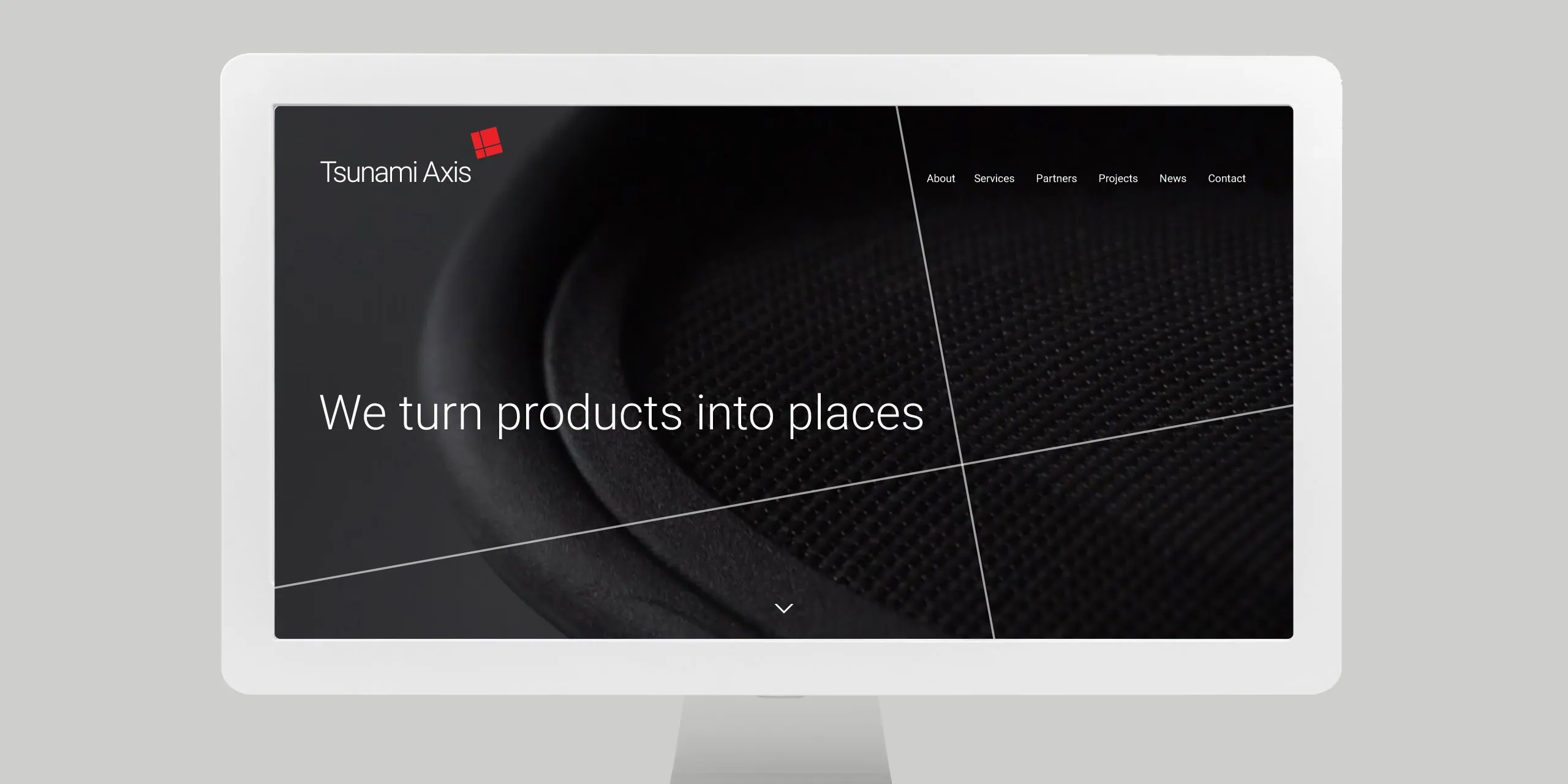 iMac mockup of Tsunami Axis homepage with “We turn products into places” headline