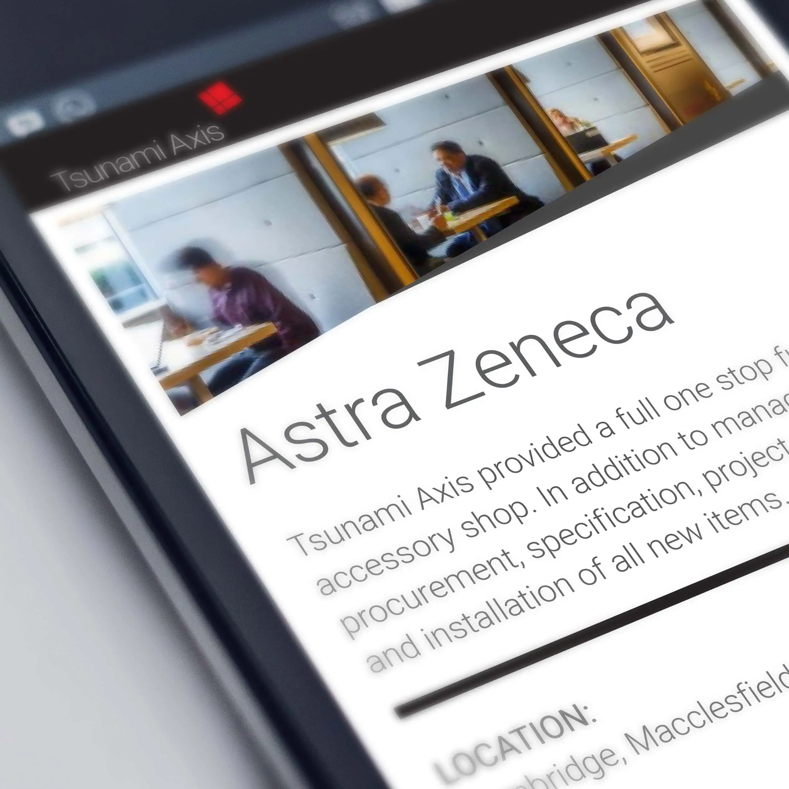 Angled device mockup displaying the Tsunami Axis “Astra Zeneca” project page