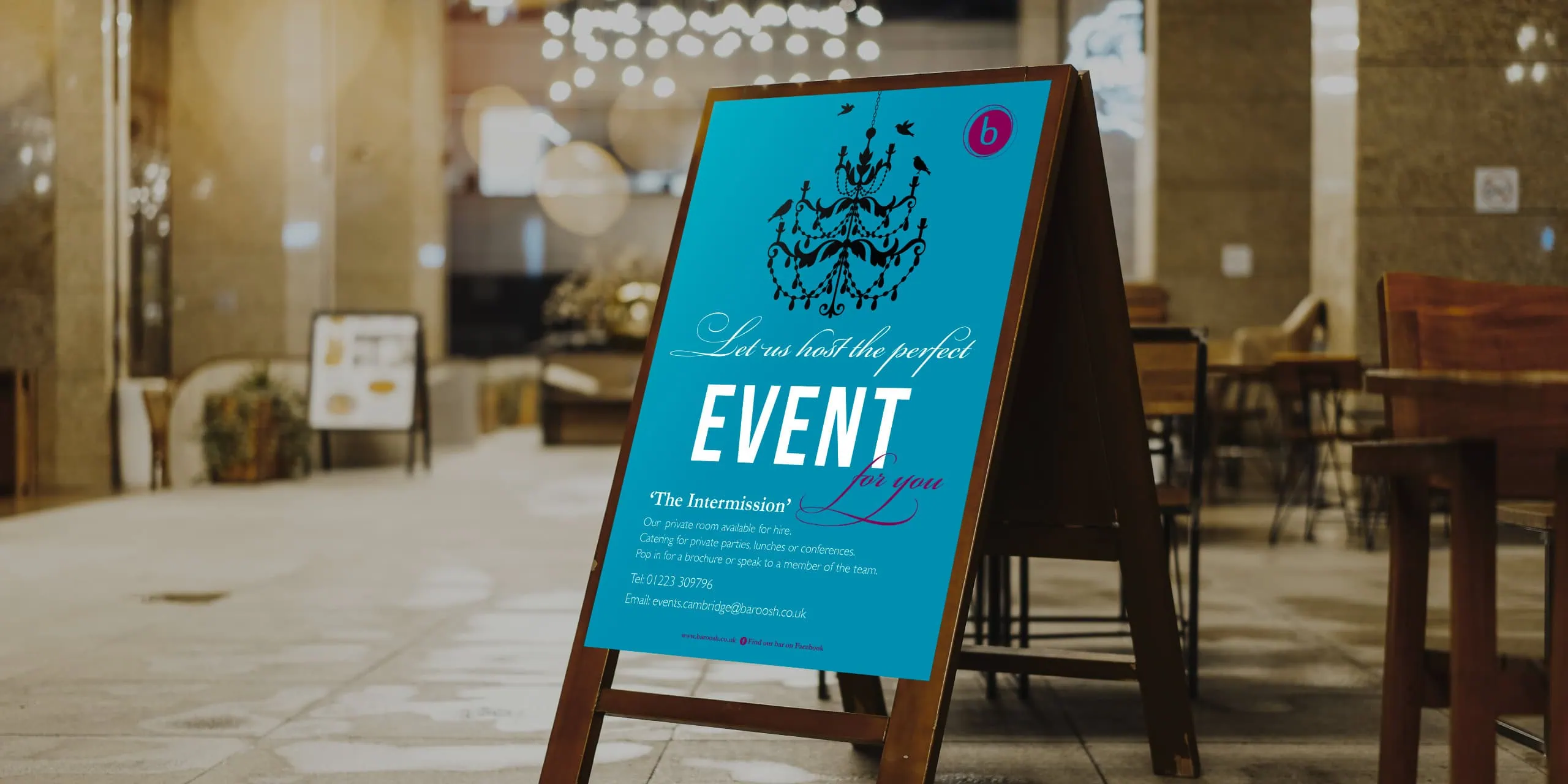 Baroosh event A-board restaurant poster outside the venue