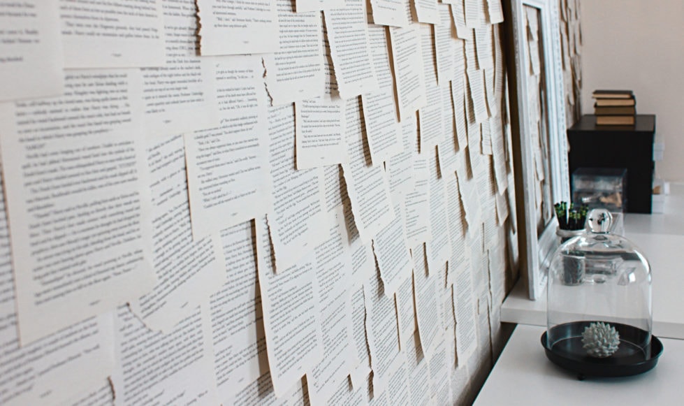 Copywriting Wall covered in pages of typed text.