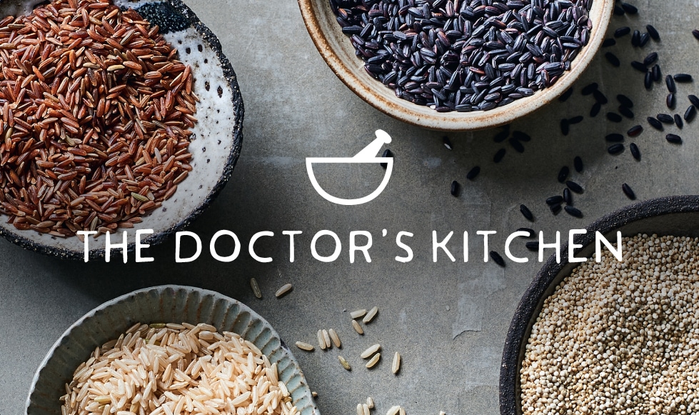 Wild rice in rustic bowls on stobe background with The Doctor's Kitchen logo reversed out white.