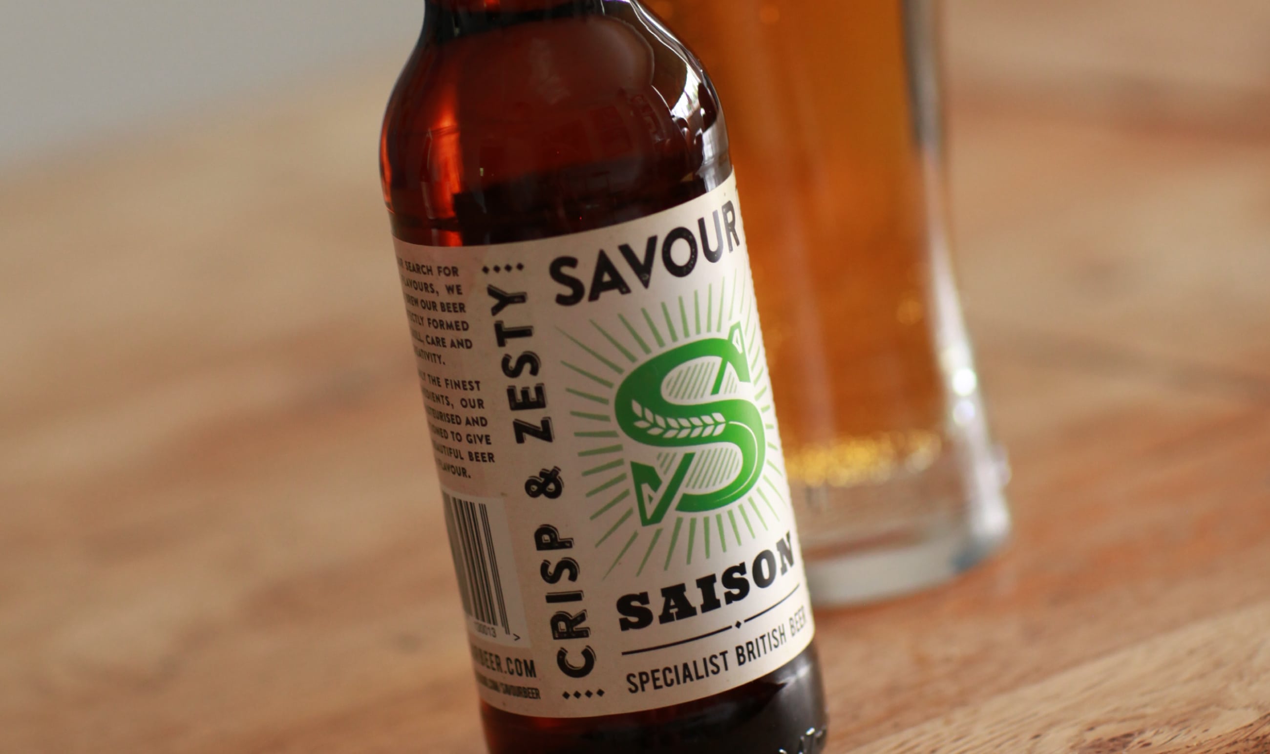 View Savour beer Bottle of Savour Beer on a rustic wooden background.