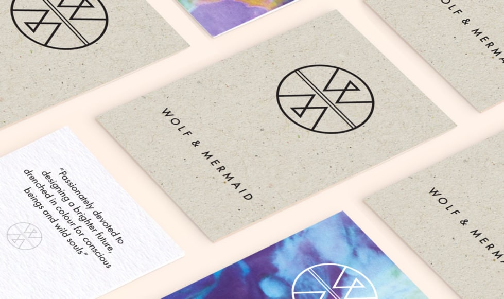 Branding Series of Wolf and Mermaid business cards displayed in a grid layout on a pale pink background.