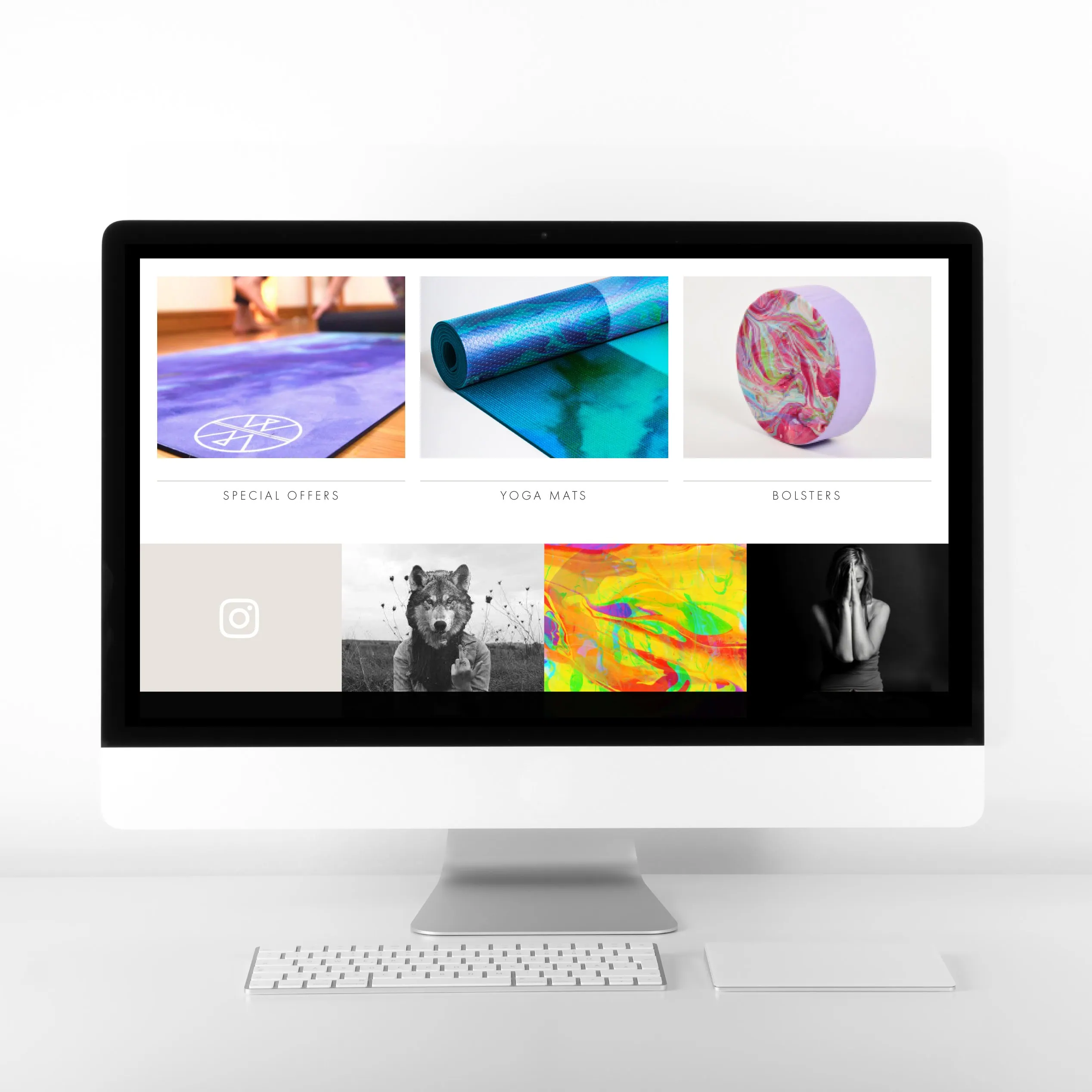 Wolf & Mermaid shop categories shown on an iMac, featuring yoga mats and bolsters