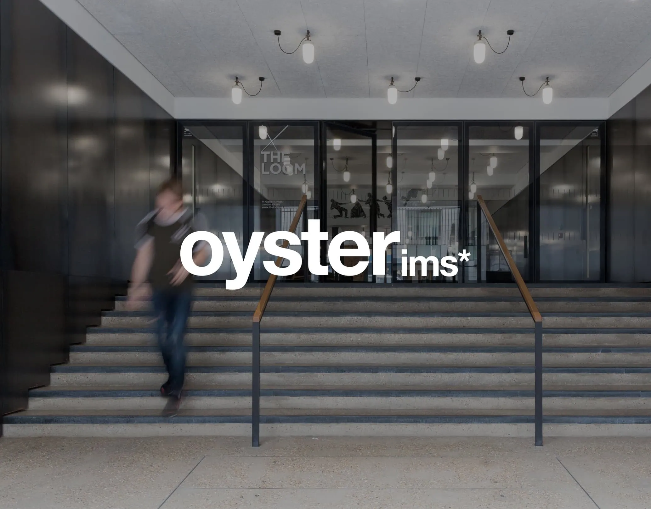 Oyster IMS logo overlaid on a modern office entrance with steps