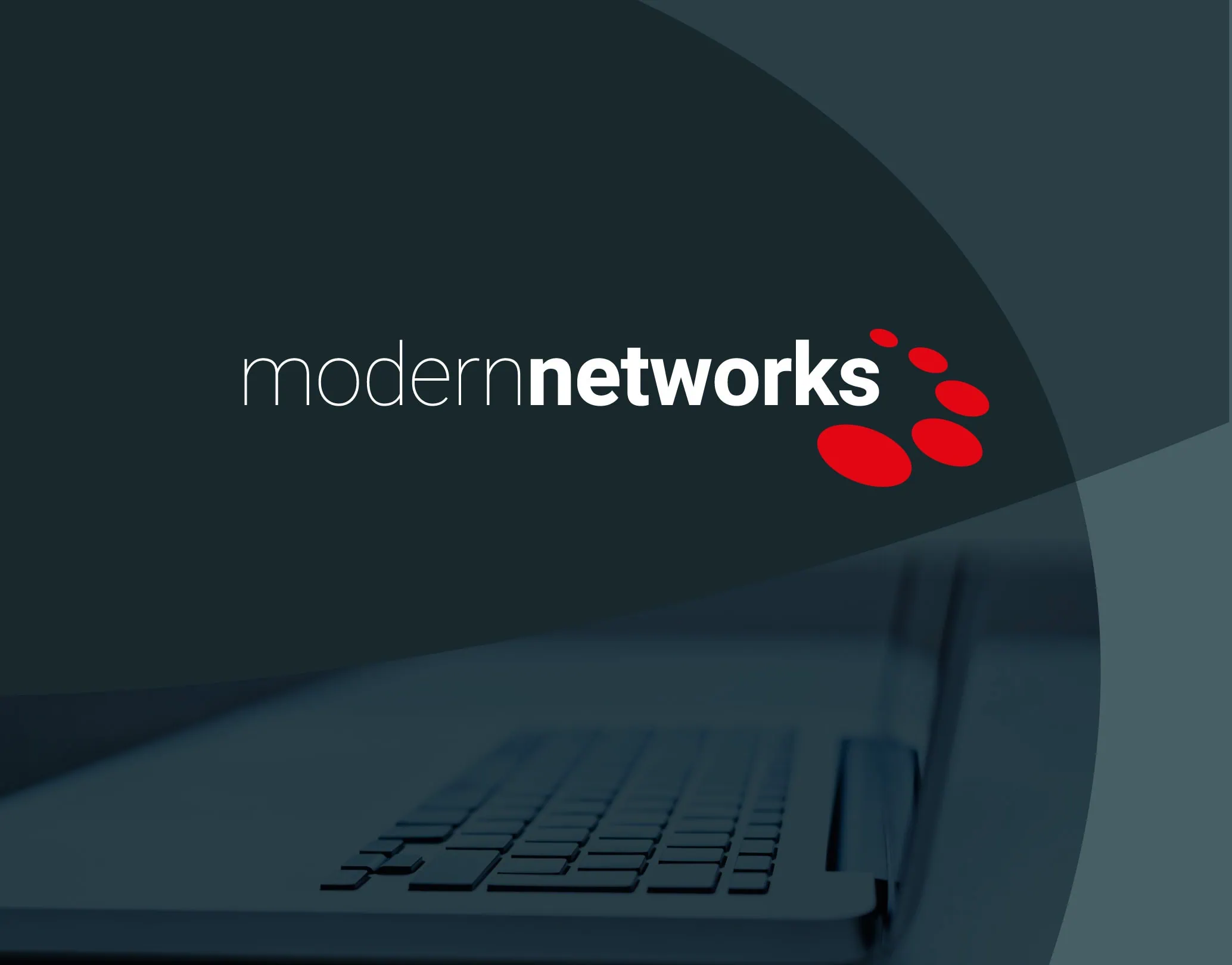 Modern Networks wordmark with red icon over a laptop keyboard background