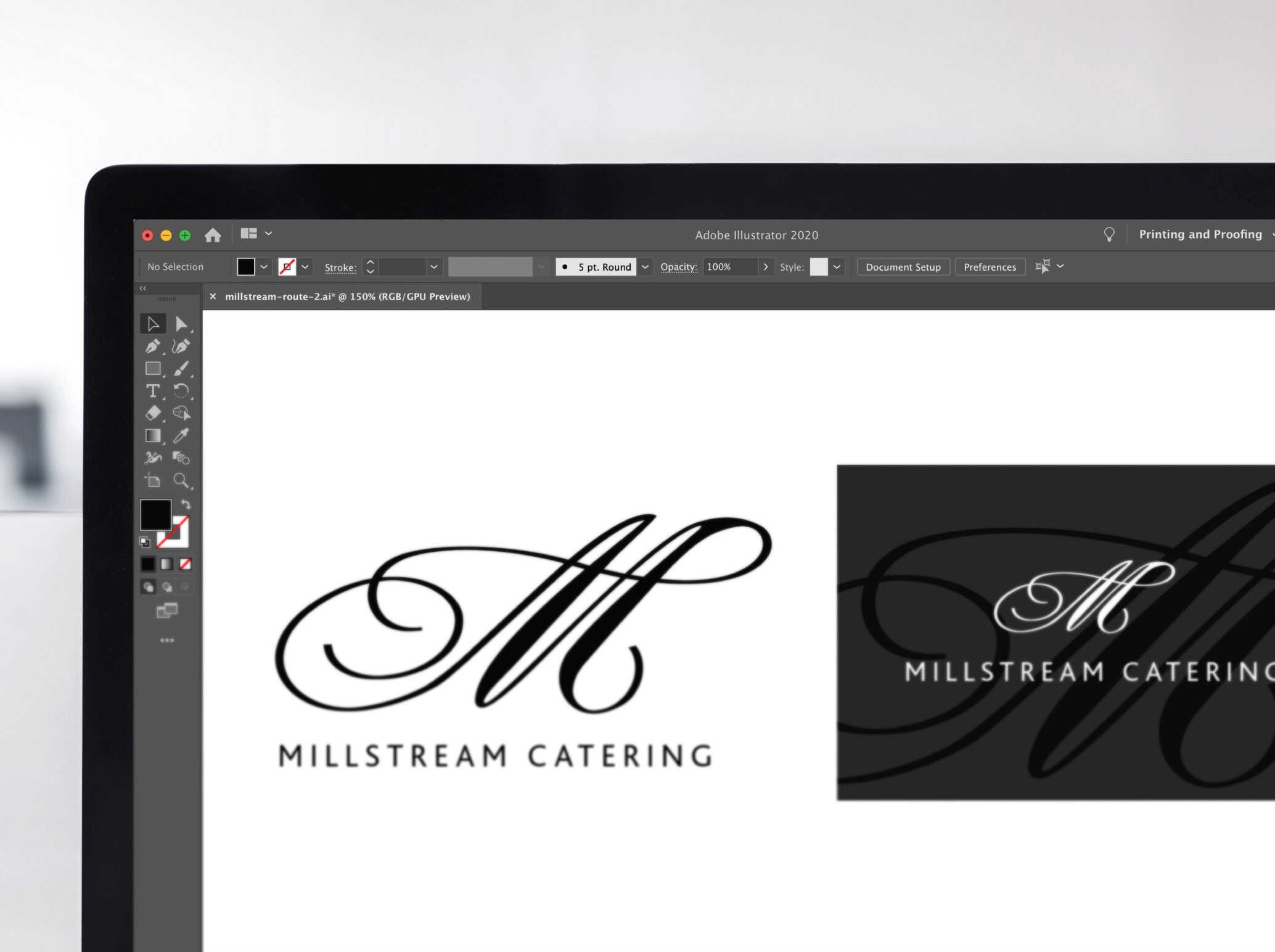 Millstream catering logo and business card designs depicted on a computer screen. A large script 'M' forms the main logo.