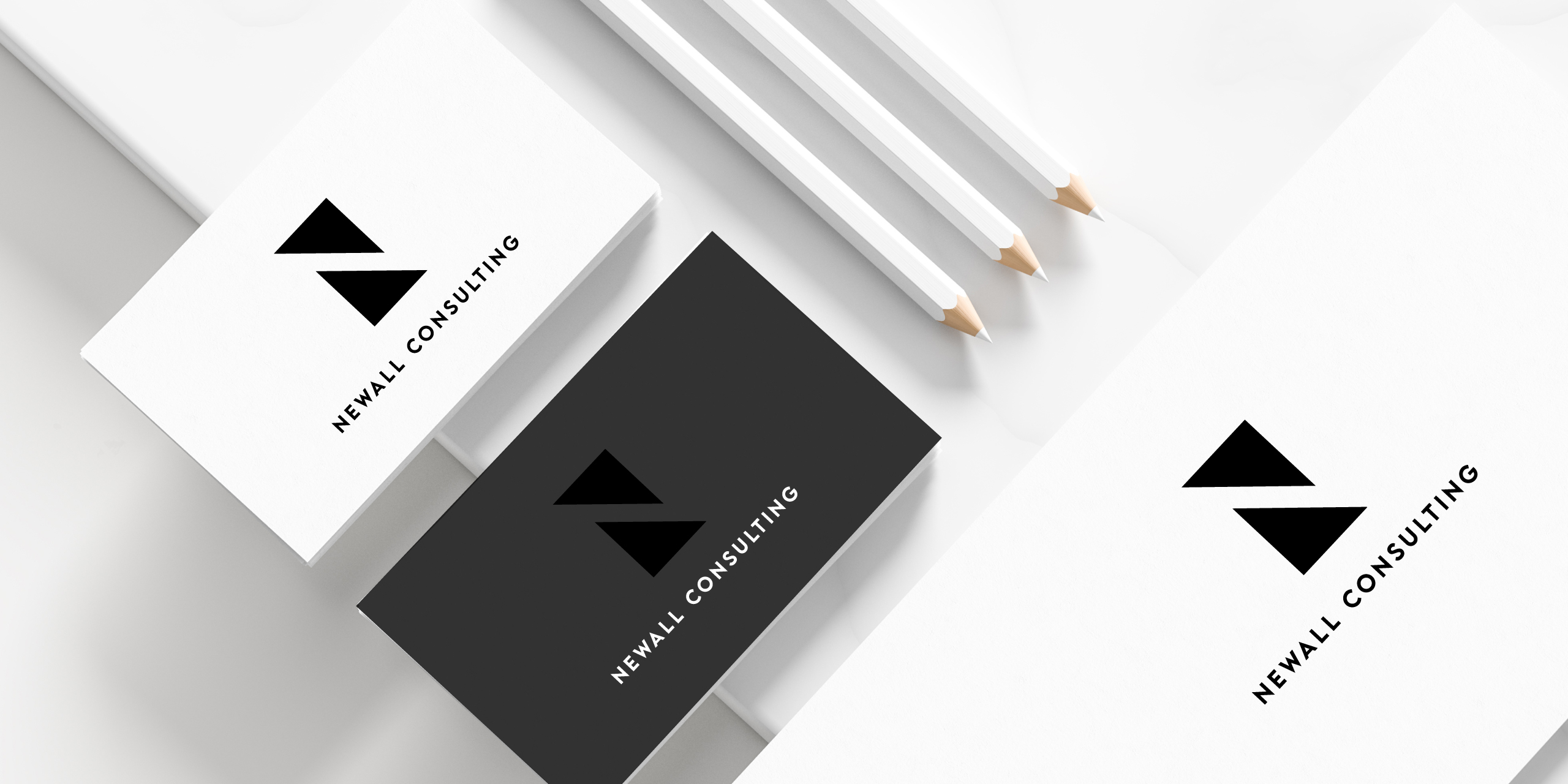 Newall Consulting business cards and stationery in monochrome