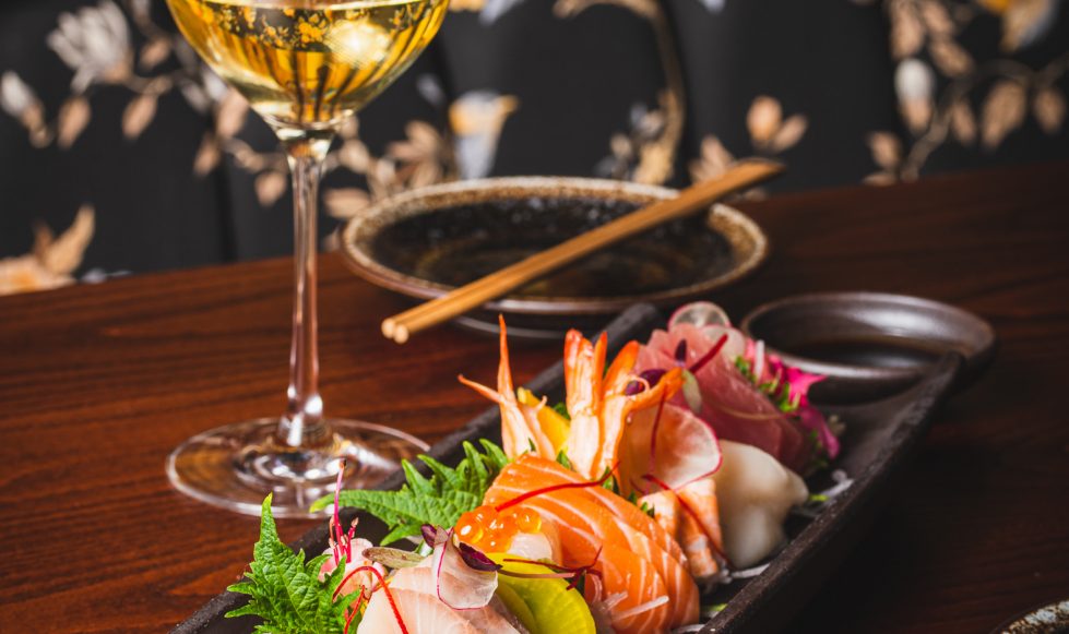 Sushi and glass of wine