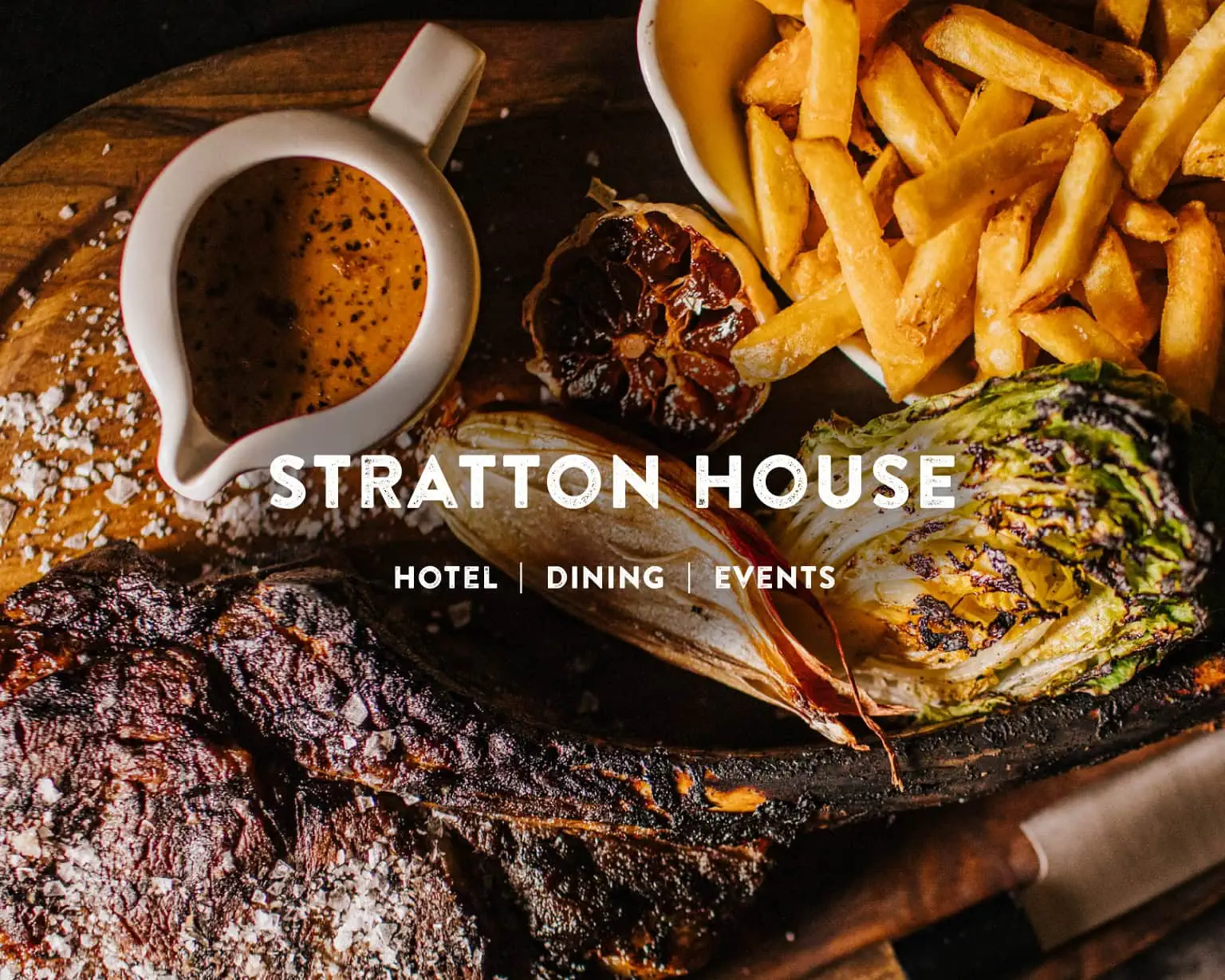 Stratton House banner over a meal with steak, chips, gravy and grilled vegetables, with the text “Hotel | Dining | Events”.