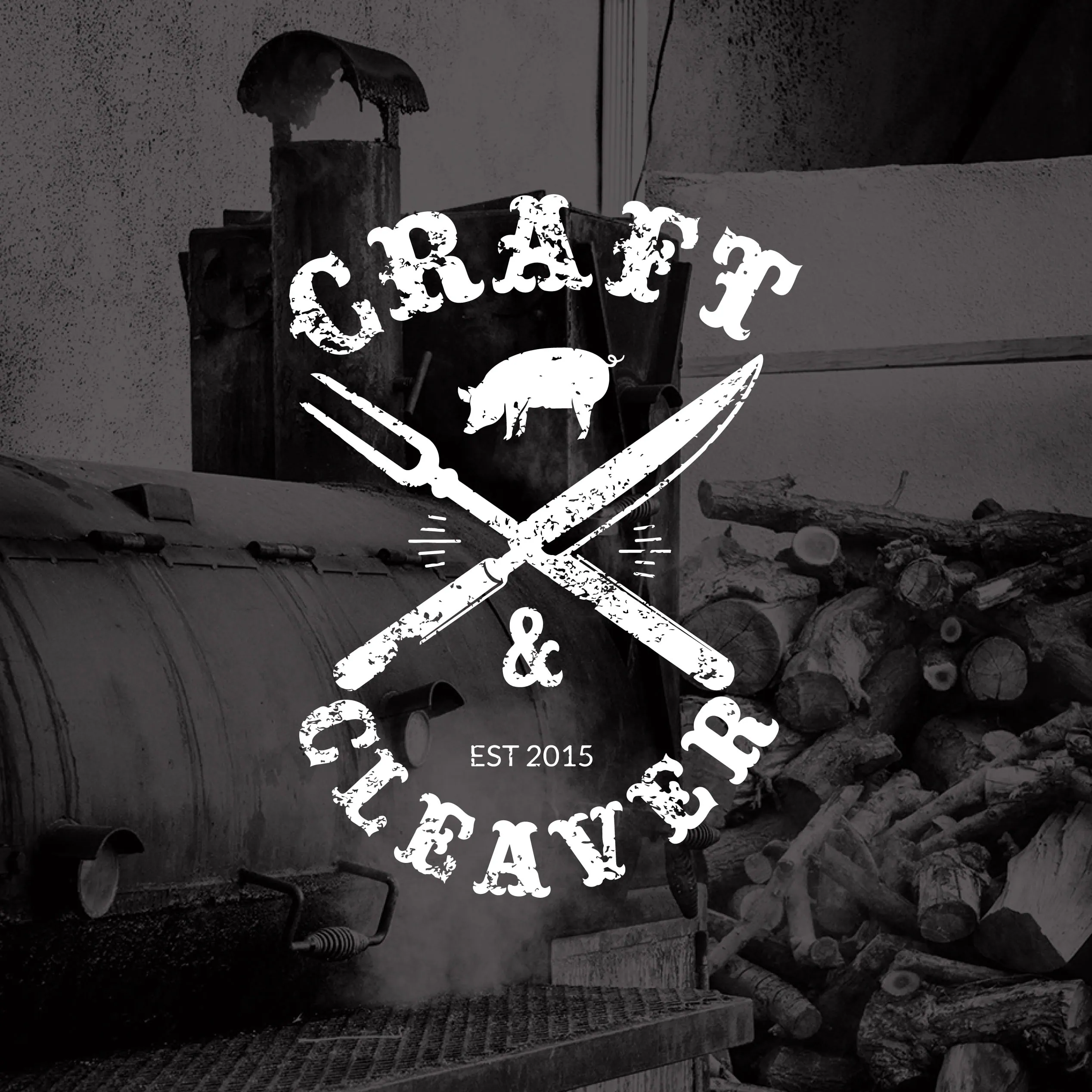 Craft & Cleaver logo over a black and white photo of a BBQ smoker and stacked logs