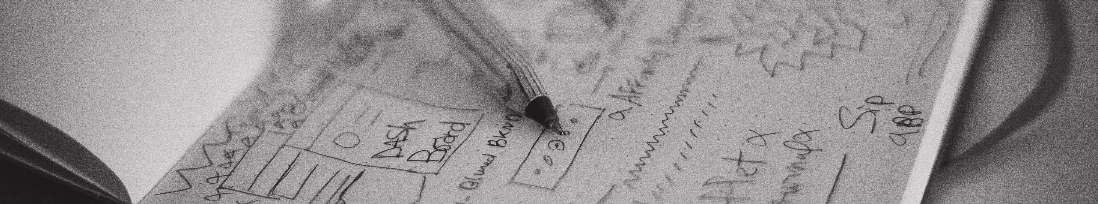 Black and white sketching on notepad during design ideation