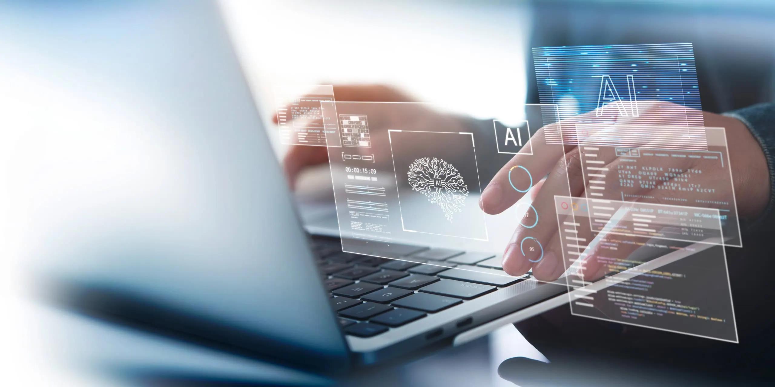 Person using a laptop with AI and data analysis holograms